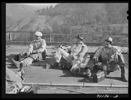 Workers on Pit River bridge eat lunch. Shasta County, California
