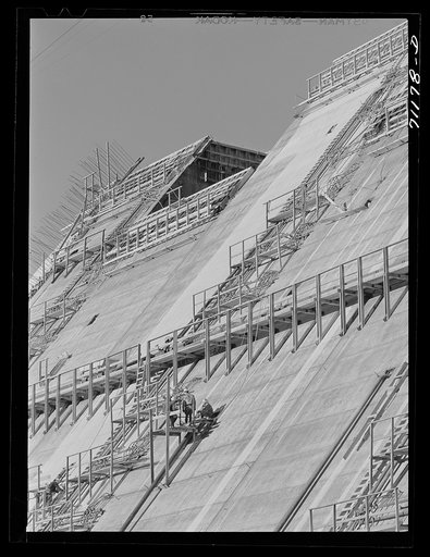 Construction work on face of Shasta Dam. Shasta County, California