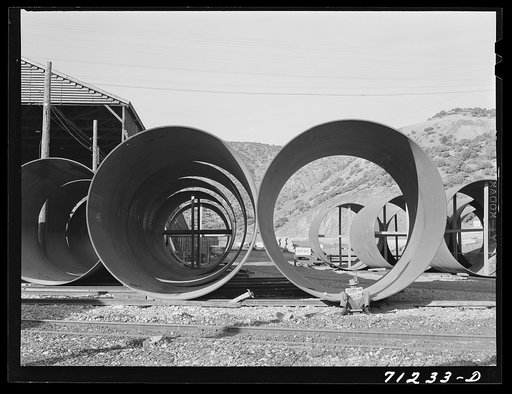 Untitled photo, possibly related to: Segments of penstock pipe which will be used to conduct water from the reservoir formed by Shasta Dam to the hydroelectric turbines. Shasta County, California