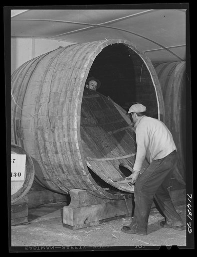 Untitled photo, possibly related to: Sonoma County, California. Coopers fitting head of wine cask