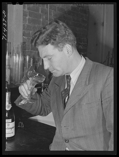 Sonoma County, California. Champagne master tests champagne for dryness, flavor and other qualities at winery