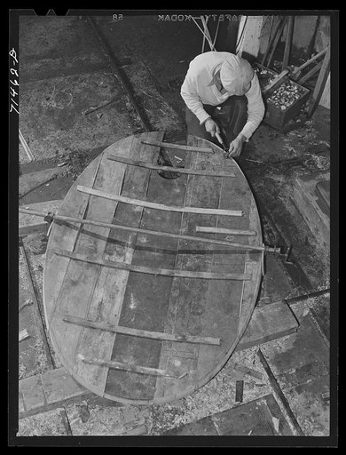 Untitled photo, possibly related to: Sonoma County, California. Coopers making head of cask for wine at the winery