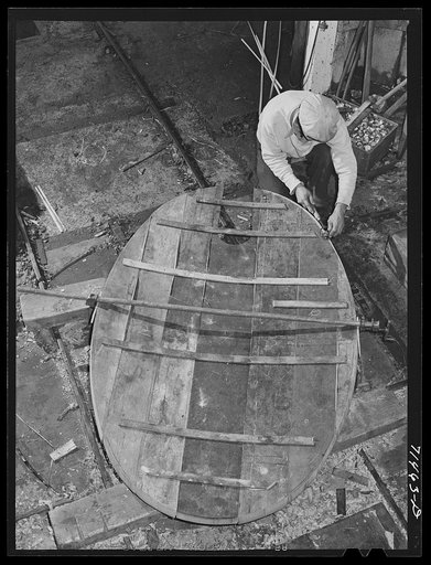 Untitled photo, possibly related to: Sonoma County, California. Coopers making head of cask for wine at the winery