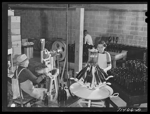 Sonoma County, California. Bottling and corking champagne in the winery