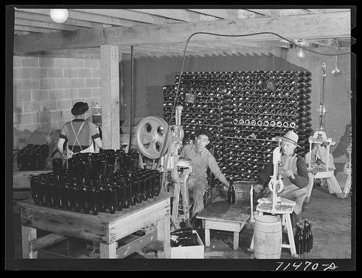 Sonoma County, California. Bottling and corking champagne in the winery
