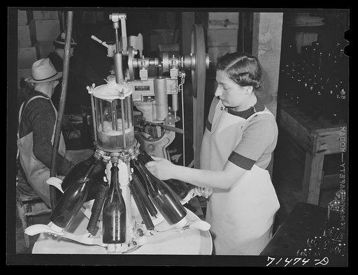 Sonoma County, California. Filling bottles with champagne at the winery