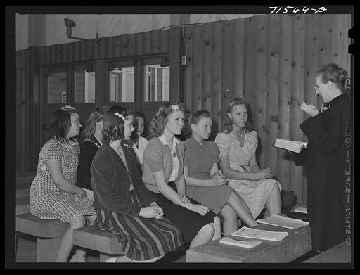 Woodville, California. FSA (Farm Security Administration) farm workers' community. Sunday school class. Sunday school and church services are held in the central community building