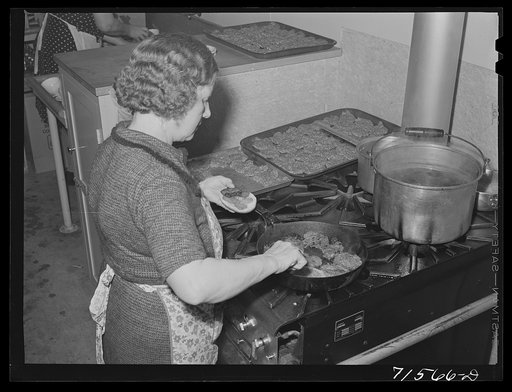 Woodville, California. FSA (Farm Security Administration) farm workers' community. The women's club sells hamburgers at the Saturday night dances