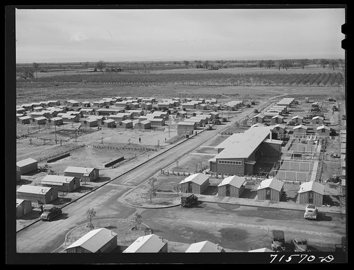 Woodville, California. FSA (Farm Security Administration) farm workers' community. Metal shelters