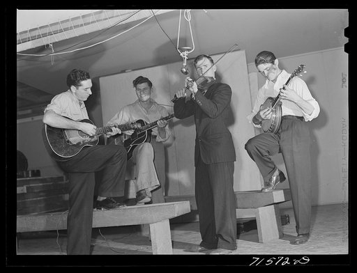 Woodville, California. FSA (Farm Security Administration) farm workers' community. Musicians at the Saturday night dance