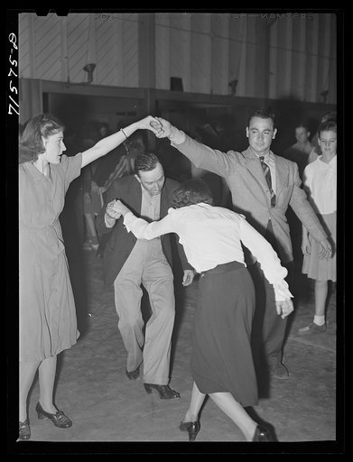 Woodville, California. FSA (Farm Security Administration) farm workers' community. Square dance at the Saturday night dance