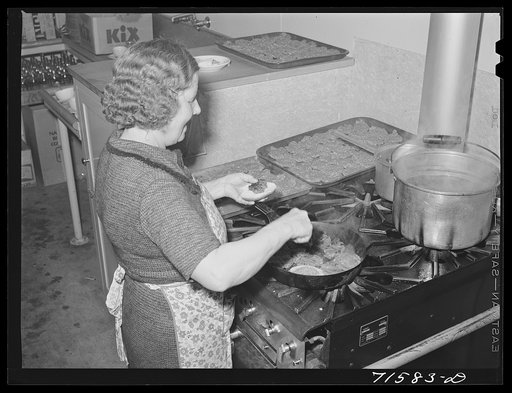 Untitled photo, possibly related to: Woodville, California. FSA (Farm Security Administration) farm workers' community. The women's club sells hamburgers at the Saturday night dances