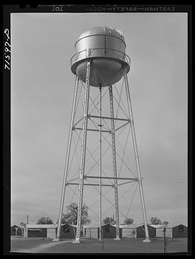 Woodville, California. FSA (Farm Security Administration) farm workers' community. Water tower
