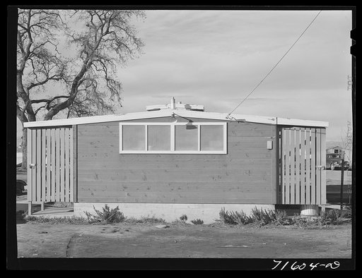 Woodville, California. FSA (Farm Security Administration) farm workers' community. End of the utility building which includes the toilets