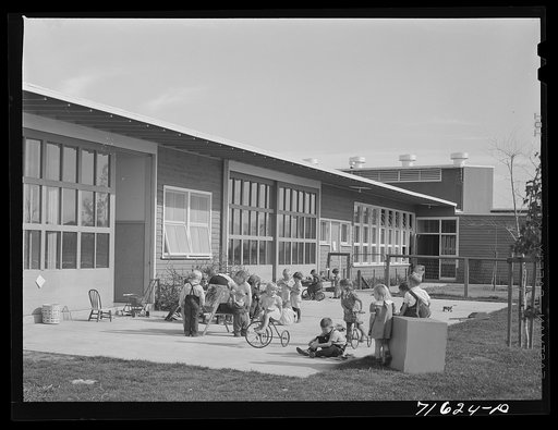 Woodville, California. FSA (Farm Security Administration) farm workers' community. Children of the nursery school playing. The nursery school uses two rooms of the central community building