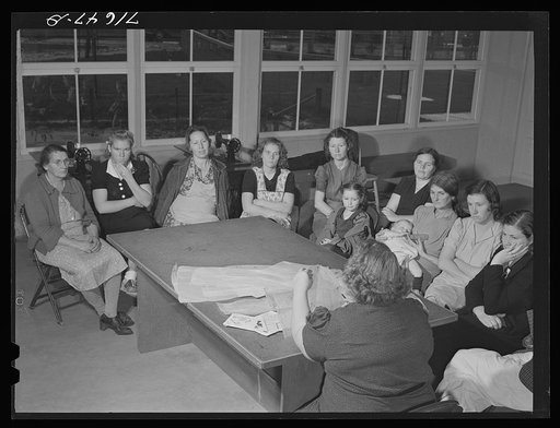 Woodville, California. FSA (Farm Security Administration) farm workers' community. Sewing class in the community building. The teacher is supplied by WPA (Work Projects Administration)
