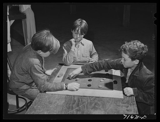 Tulare County, California. FSA (Farm Security Administration) farm workers' camp. Games in the recreation room