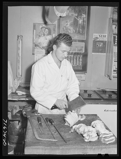 Woodville, California. FSA (Farm Security Administration) farm workers' community. Butcher at the cooperative store