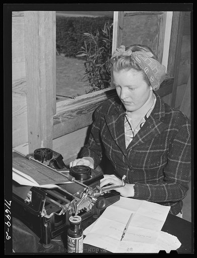 Untitled photo, possibly related to: Tulare County, California. FSA (Farm Security Administration) farm workers' camp. Getting out the camp paper