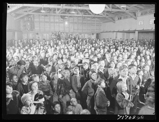 Tulare County, California. FSA (Farm Security Administration) farm workers' camp. At the movies