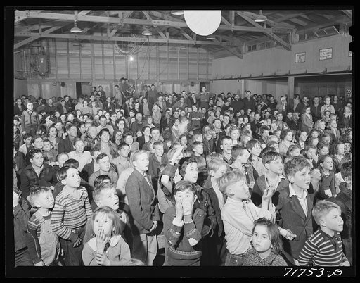 Tulare County, California. FSA (Farm Security Administration) farm workers' camp. At the movies