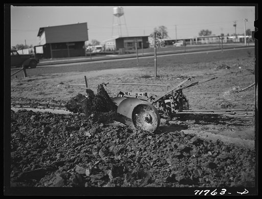 Untitled photo, possibly related to: Woodville, California. FSA (Farm Security Administration) farm workers' community. Disk harrow in the community garden
