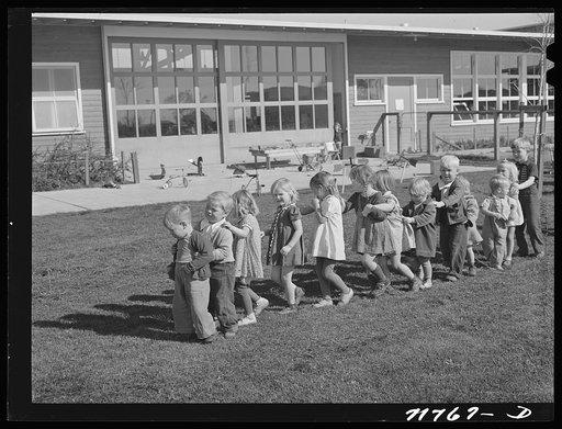 Woodville, California. FSA (Farm Security Administration) farm workers' community. Nursery children playing
