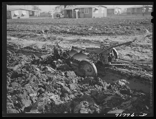 Woodville, California. FSA (Farm Security Administration) farm workers' community. Disk harrow in the community garden