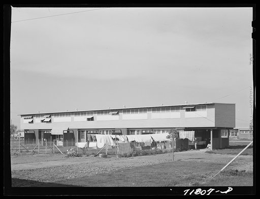 Untitled photo, possibly related to: Woodville, California. FSA (Farm Security Administration) farm workers' community. Apartment building for permanent farm workers