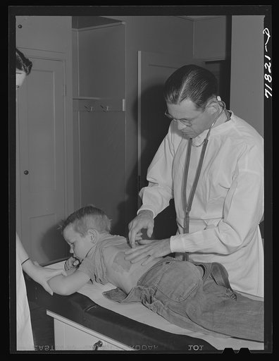 Untitled photo, possibly related to: Woodville, California. FSA (Farm Security Administration) farm workers' community. Doctor examining child of agricultural workers at the clinic