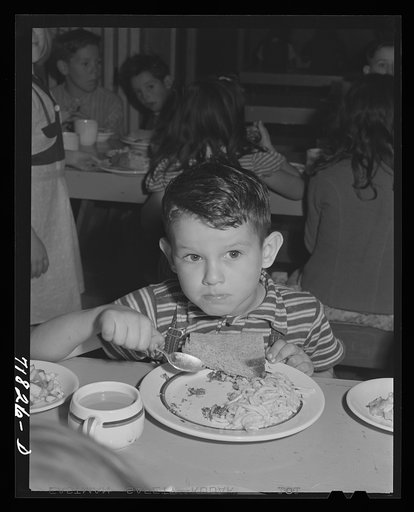 Woodville, California. FSA (Farm Security Administration) farm workers' community. Hot lunch for a schoolchild