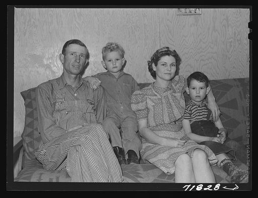 Woodville, California. FSA (Farm Security Administration) farm workers' community. Family of agricultural workers who live in a garden house