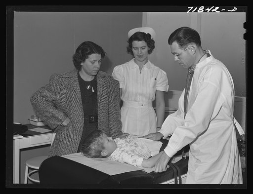 Untitled photo, possibly related to: Woodville, California. FSA (Farm Security Administration) farm workers' community. Doctor examining child of agricultural workers at the clinic