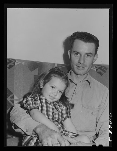 Man and his daughter who live at the Camelback Farms, FSA (Farm Security Administration) project at Phoenix, Arizona