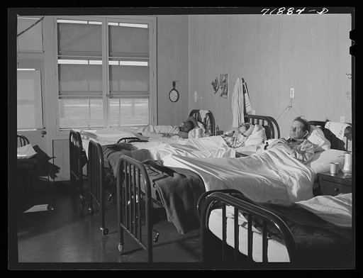 In the men's ward at the Cairns General Hospital at the FSA (Farm Security Administration) farmworkers' community. Eleven Mile Corner, Arizona