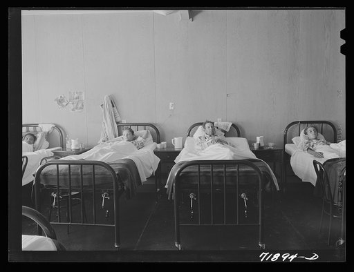 Men's ward at the Cairns General Hospital at the FSA (Farm Security Administration) farm workers' community. Eleven Mile Corner, Arizona