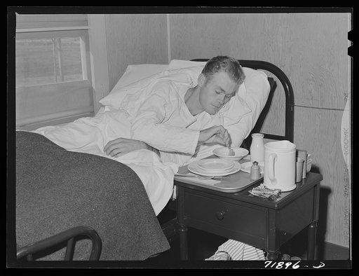Lunchtime at the Cairns General Hospital at the FSA (Farm Security Administration) farm workers' community. Eleven Mile Corner, Arizona