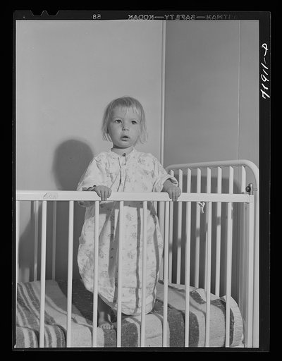 Little girl who is a patient at the Cairns General Hospital at the FSA (Farm Security Administration) farm workers' community at Eleven Mile Corner, Arizona