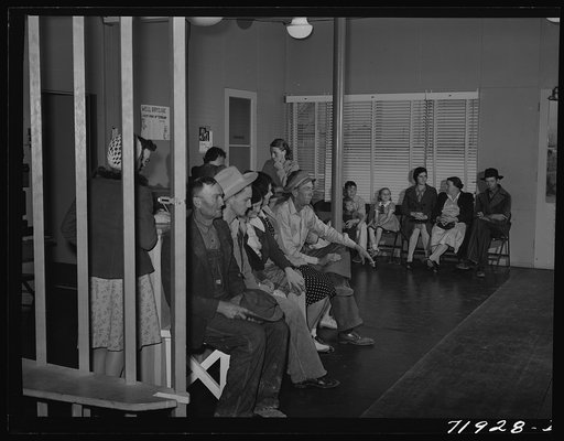 In the waiting room at the clinic at the FSA (Farm Security Administration) farm workers' community. Eleven Mile Corner, Arizona