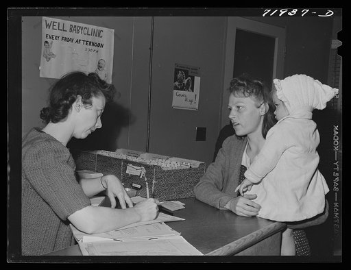 Eleven Mile Corner, Arizona. Cairns General Hospital, FSA (Farm Security Administration) farm workers' community. Registering at the clinic