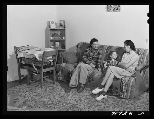 In the living room of house at the Camelback Farms, a FSA (Farm Security Administration) project at Phoenix, Arizona