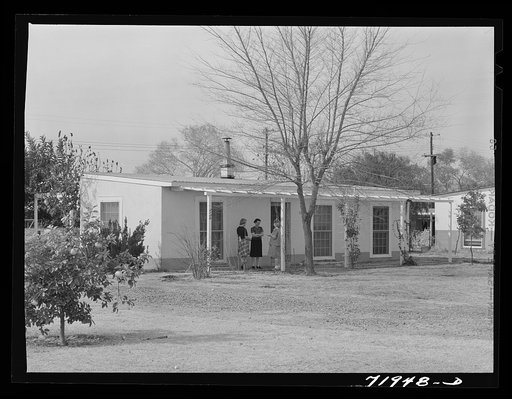 Phoenix, Arizona. Camelback Farms, FSA (Farm Security Administration) project. Neighbors meeting at one of the houses