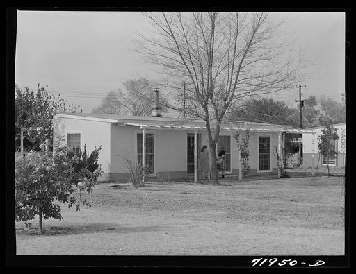 Untitled photo, possibly related to: Phoenix, Arizona. Camelback Farms, FSA (Farm Security Administration) project. Neighbors meeting at one of the houses