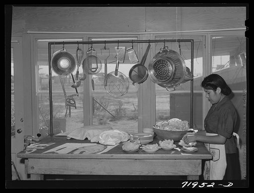 NYA (National Youth Administration) girls help in kitchen of the Cairns General Hospital at the FSA (Farm Security Administration) farm workers' community. Eleven Mile Corner