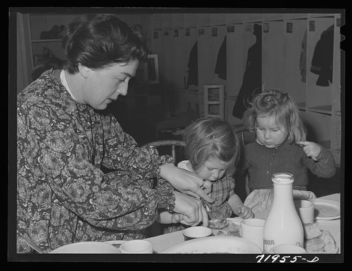 Lunch in the nursery school at the FSA (Farm Security Administration) farm workers' community at Woodville, California