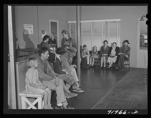 Waiting in the clinic of the Cairns General Hospital at the FSA (Farm Security Administration) farm workers' community. Eleven Mile Corner, Arizona