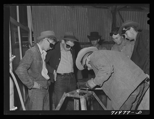 Pinal County, Arizona. Defense training project, U.S. Department of Education welding school. All these men and boys live on the farms and ranches nearby. Some men, who are agricultural workers living at the FSA (Farm Security Administration) farm workers' community at Eleven Mile Corner, attend thi