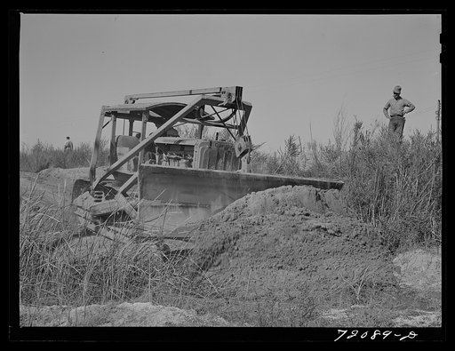 Untitled photo, possibly related to: Bulldozer works on irrigation ditch. Imperial County, California