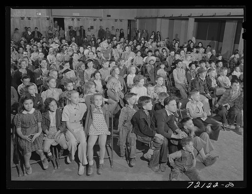At the picture show at the FSA (Farm Security Administration) farm workers' community mobile unit. Friendly Corners, Arizona