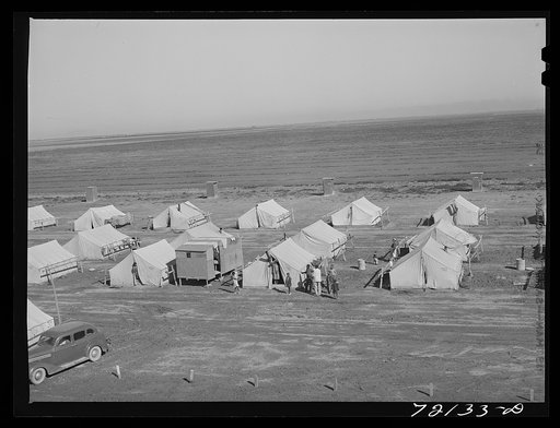 Tent homes of farm workers at the FSA (Farm Security Administration) farm workers' community mobile unit. Friendly Corners, Arizona